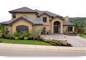 Stone and stucco home with forest and mountain views