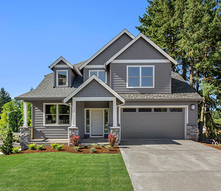 house with green lawn
